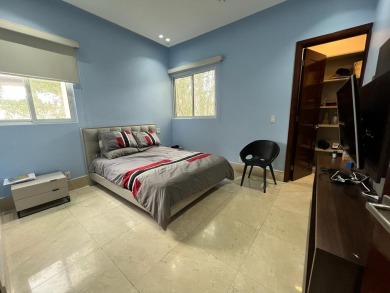 Spacious and comfortable apartment with a grass-covered patio on  in  - for sale on GolfHomes.com, golf home, golf lot