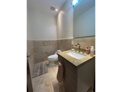 Spacious and comfortable apartment with a grass-covered patio on  in  - for sale on GolfHomes.com, golf home, golf lot