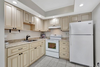 WONDERFUL 1ST FLOOR 1BR/ 1.5 BA UNIT IN NORMANDY D W/ IMPACT on Kings Point Golf -Flanders Way in Florida - for sale on GolfHomes.com, golf home, golf lot