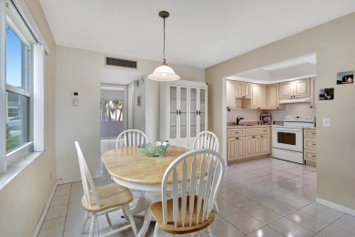 WONDERFUL 1ST FLOOR 1BR/ 1.5 BA UNIT IN NORMANDY D W/ IMPACT on Kings Point Golf -Flanders Way in Florida - for sale on GolfHomes.com, golf home, golf lot