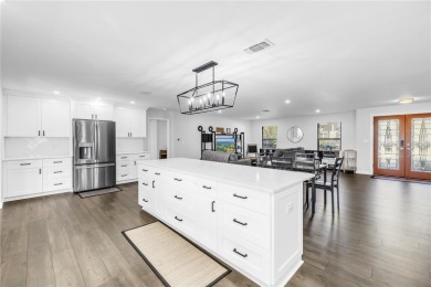 Where golf community living meets lakeside retreat... all just a on Seminole Lake Country Club in Florida - for sale on GolfHomes.com, golf home, golf lot
