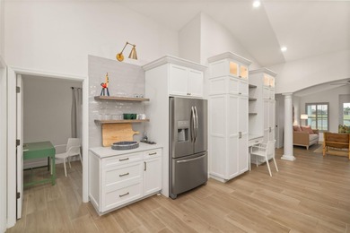 Experience refined Florida living in this fully remodeled on Rotonda Golf and Country Club The Links Course in Florida - for sale on GolfHomes.com, golf home, golf lot