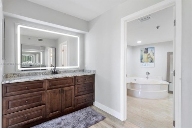 Updated condo in Boca Pointe offering natural light, comfort on Boca Pointe Country Club in Florida - for sale on GolfHomes.com, golf home, golf lot