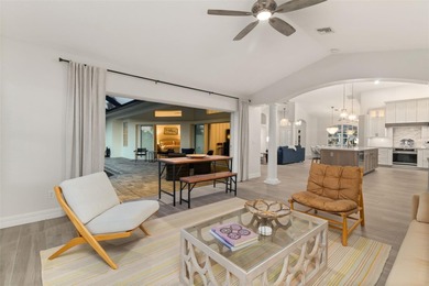 Experience refined Florida living in this fully remodeled on Rotonda Golf and Country Club The Links Course in Florida - for sale on GolfHomes.com, golf home, golf lot