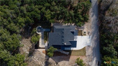 Welcome to 20029 Continental Drive where architectural on Highland Lakes Golf Course in Texas - for sale on GolfHomes.com, golf home, golf lot