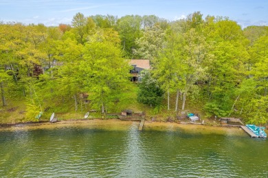 Enjoy breathtaking water views from this spacious 4-bedroom on St. Ives Golf Club in Michigan - for sale on GolfHomes.com, golf home, golf lot