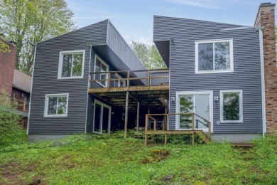 Enjoy breathtaking water views from this spacious 4-bedroom on St. Ives Golf Club in Michigan - for sale on GolfHomes.com, golf home, golf lot