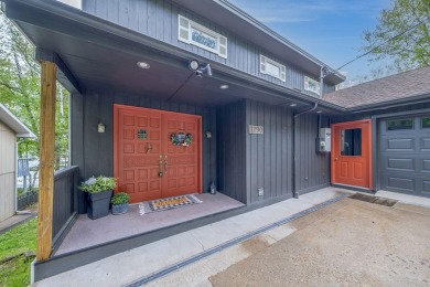 Enjoy breathtaking water views from this spacious 4-bedroom on St. Ives Golf Club in Michigan - for sale on GolfHomes.com, golf home, golf lot