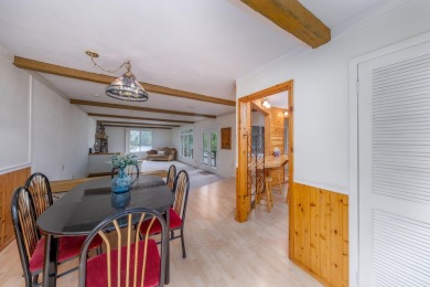 Enjoy breathtaking water views from this spacious 4-bedroom on St. Ives Golf Club in Michigan - for sale on GolfHomes.com, golf home, golf lot