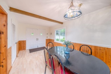 Enjoy breathtaking water views from this spacious 4-bedroom on St. Ives Golf Club in Michigan - for sale on GolfHomes.com, golf home, golf lot