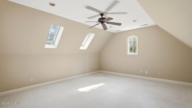 Welcome to 380 Grove Rd, a beautifully crafted Bundy Homes on Pine Needles Lodge and Golf Club in North Carolina - for sale on GolfHomes.com, golf home, golf lot