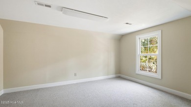 Welcome to 380 Grove Rd, a beautifully crafted Bundy Homes on Pine Needles Lodge and Golf Club in North Carolina - for sale on GolfHomes.com, golf home, golf lot