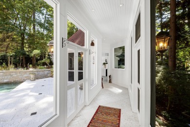 Experience the ultimate in family living at 109 Charlemagne on MacGregor Downs Country Club in North Carolina - for sale on GolfHomes.com, golf home, golf lot