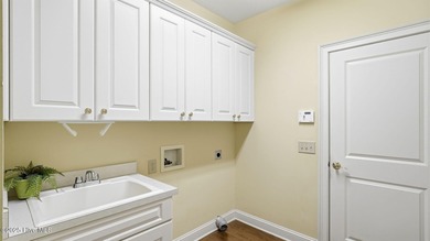 Welcome to 380 Grove Rd, a beautifully crafted Bundy Homes on Pine Needles Lodge and Golf Club in North Carolina - for sale on GolfHomes.com, golf home, golf lot