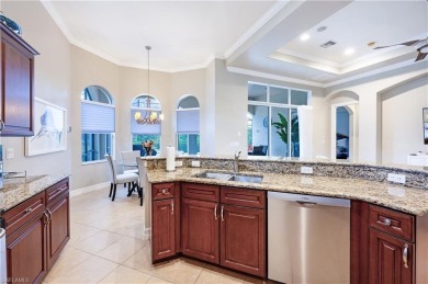 Immaculately maintained pool home which overlooks the lake on a on Lely Resort Golf and Country Club in Florida - for sale on GolfHomes.com, golf home, golf lot