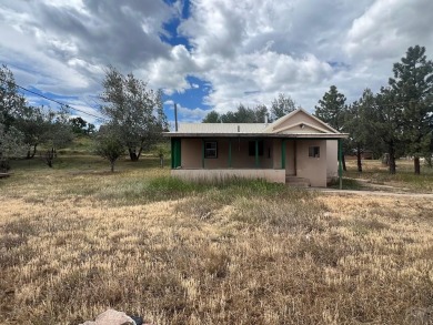 Large lot in the town of La Veta Colorado, with a garage, and a on Grandote Peaks Golf Club in Colorado - for sale on GolfHomes.com, golf home, golf lot