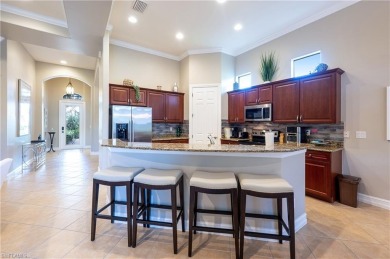 Immaculately maintained pool home which overlooks the lake on a on Lely Resort Golf and Country Club in Florida - for sale on GolfHomes.com, golf home, golf lot