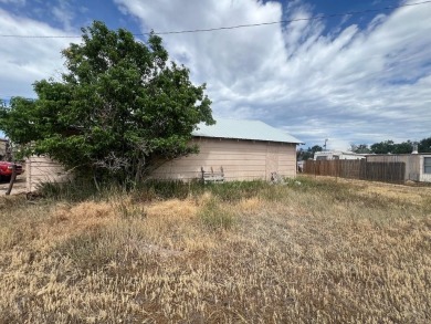 Large lot in the town of La Veta Colorado, with a garage, and a on Grandote Peaks Golf Club in Colorado - for sale on GolfHomes.com, golf home, golf lot