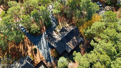 Welcome to 380 Grove Rd, a beautifully crafted Bundy Homes on Pine Needles Lodge and Golf Club in North Carolina - for sale on GolfHomes.com, golf home, golf lot