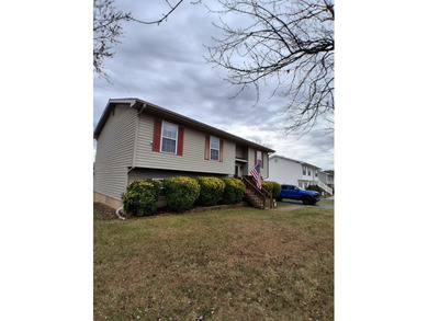 This split-foyer home sits on a desirable corner lot and on Brookside Golf Course in Virginia - for sale on GolfHomes.com, golf home, golf lot
