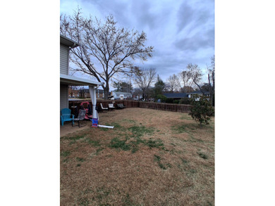 This split-foyer home sits on a desirable corner lot and on Brookside Golf Course in Virginia - for sale on GolfHomes.com, golf home, golf lot