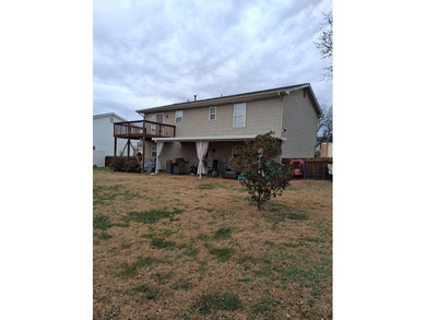 This split-foyer home sits on a desirable corner lot and on Brookside Golf Course in Virginia - for sale on GolfHomes.com, golf home, golf lot