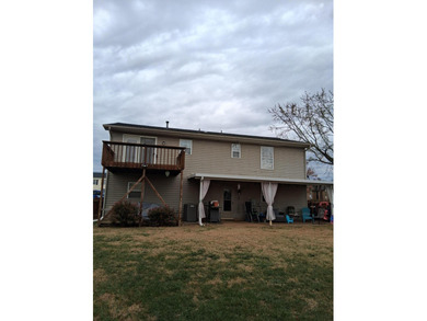 This split-foyer home sits on a desirable corner lot and on Brookside Golf Course in Virginia - for sale on GolfHomes.com, golf home, golf lot