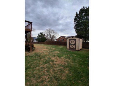 This split-foyer home sits on a desirable corner lot and on Brookside Golf Course in Virginia - for sale on GolfHomes.com, golf home, golf lot