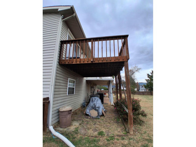 This split-foyer home sits on a desirable corner lot and on Brookside Golf Course in Virginia - for sale on GolfHomes.com, golf home, golf lot