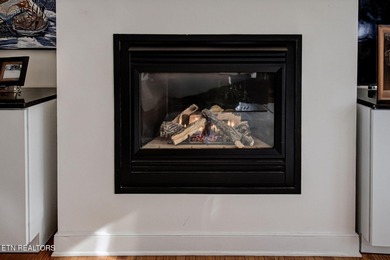 This custom-built home in Tellico Village's desirable Tommotley on Tanasi Golf Course in Tennessee - for sale on GolfHomes.com, golf home, golf lot