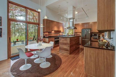 This custom-built home in Tellico Village's desirable Tommotley on Tanasi Golf Course in Tennessee - for sale on GolfHomes.com, golf home, golf lot