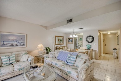 Terrific 55+ living! Extra bright end unit with beautiful golf on The Little Club in Florida - for sale on GolfHomes.com, golf home, golf lot