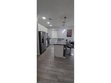 Welcome to 5069 Arancia Lane, a beautifully appointed, partially on Panther Run Golf Club in Florida - for sale on GolfHomes.com, golf home, golf lot