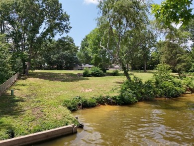 Build your boat dock HERE! This large waterfront lot in the on Emerald Bay Club in Texas - for sale on GolfHomes.com, golf home, golf lot