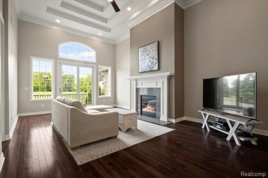 Enjoy maintenance-free golf course living on the first green of on Pine Knob Golf Club - Hawk in Michigan - for sale on GolfHomes.com, golf home, golf lot
