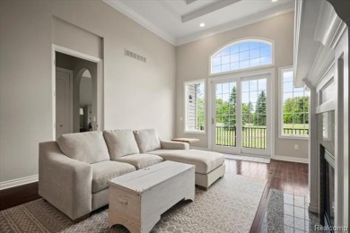 Enjoy maintenance-free golf course living on the first green of on Pine Knob Golf Club - Hawk in Michigan - for sale on GolfHomes.com, golf home, golf lot
