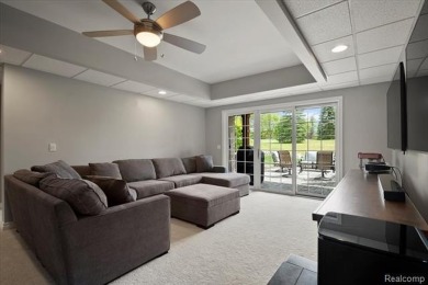 Enjoy maintenance-free golf course living on the first green of on Pine Knob Golf Club - Hawk in Michigan - for sale on GolfHomes.com, golf home, golf lot