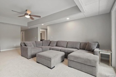 Enjoy maintenance-free golf course living on the first green of on Pine Knob Golf Club - Hawk in Michigan - for sale on GolfHomes.com, golf home, golf lot