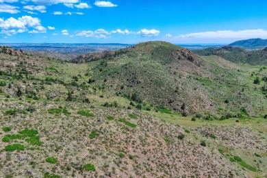 With mostly pines, aspens and rock outcroppings, this property on Fox Acres Country Club in Colorado - for sale on GolfHomes.com, golf home, golf lot