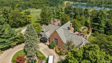 Enjoy maintenance-free golf course living on the first green of on Pine Knob Golf Club - Hawk in Michigan - for sale on GolfHomes.com, golf home, golf lot
