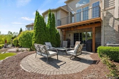 Enjoy maintenance-free golf course living on the first green of on Pine Knob Golf Club - Hawk in Michigan - for sale on GolfHomes.com, golf home, golf lot