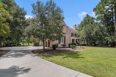 Nestled in the exclusive, gated golf course community of Dunes on Dunes West Golf Club in South Carolina - for sale on GolfHomes.com, golf home, golf lot