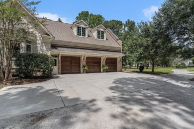 Nestled in the exclusive, gated golf course community of Dunes on Dunes West Golf Club in South Carolina - for sale on GolfHomes.com, golf home, golf lot