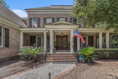 Nestled in the exclusive, gated golf course community of Dunes on Dunes West Golf Club in South Carolina - for sale on GolfHomes.com, golf home, golf lot