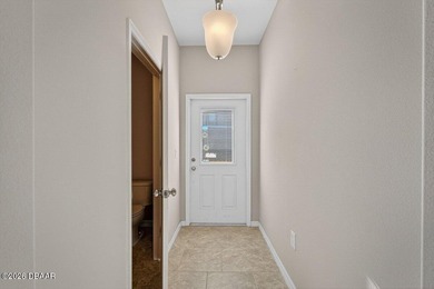 Enjoy maintenance-free living in this beautiful 2BR/2.5BA on LPGA International Golf Course in Florida - for sale on GolfHomes.com, golf home, golf lot