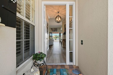 This lovely updated home offers stunning lake views, on a on Lost Lake Golf Club in Florida - for sale on GolfHomes.com, golf home, golf lot