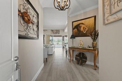 This lovely updated home offers stunning lake views, on a on Lost Lake Golf Club in Florida - for sale on GolfHomes.com, golf home, golf lot