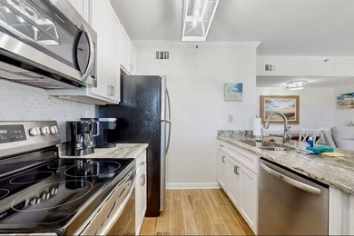 Sitting pretty on the top floor, this beautifully refreshed on Kiva Dunes Golf Club in Alabama - for sale on GolfHomes.com, golf home, golf lot