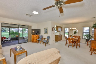 Welcome to this cozy and well-maintained Sunrise II model on Falcon Watch Golf Club in Florida - for sale on GolfHomes.com, golf home, golf lot