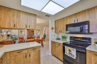 Welcome to this cozy and well-maintained Sunrise II model on Falcon Watch Golf Club in Florida - for sale on GolfHomes.com, golf home, golf lot